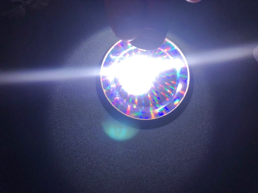 A Pleiadian Cosmic Healing Disc refracting light during the soundbath